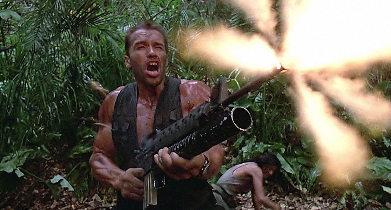 Dutch opening up with a full auto M16 after the death of one of his squad members in the movie Predator.
